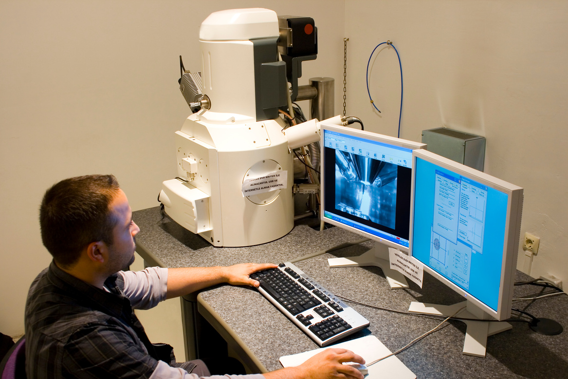 scientist work on electron microscopy